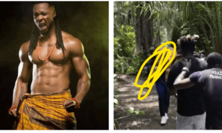 Nigerians react to new music video of singer, Flavour carrying a butt nak*d lady